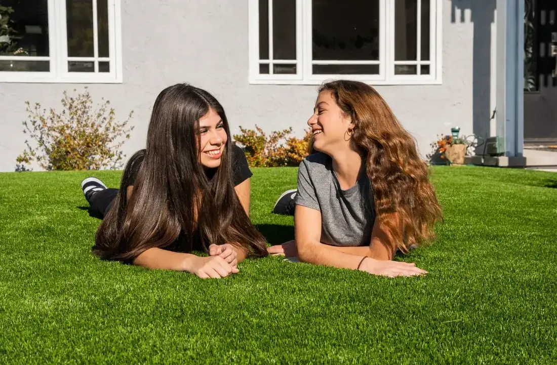 Family backyard turf ready for kids after a TurFresh service