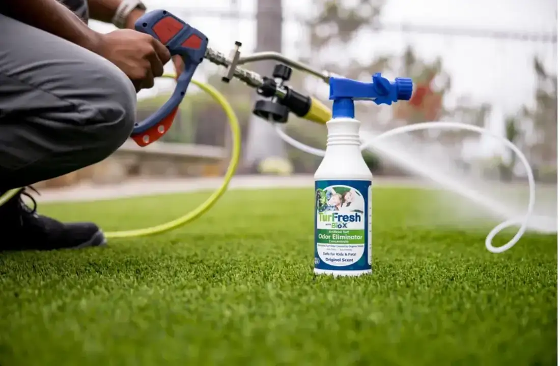 TurFresh odor treatment being applied to pet turf