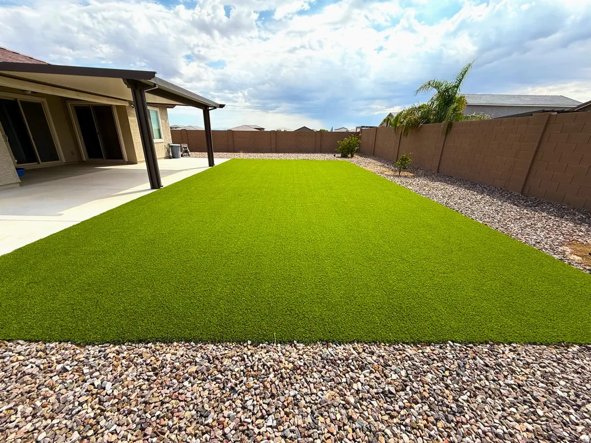 Completed TurFresh turf care visit on an Arizona backyard artificial lawn